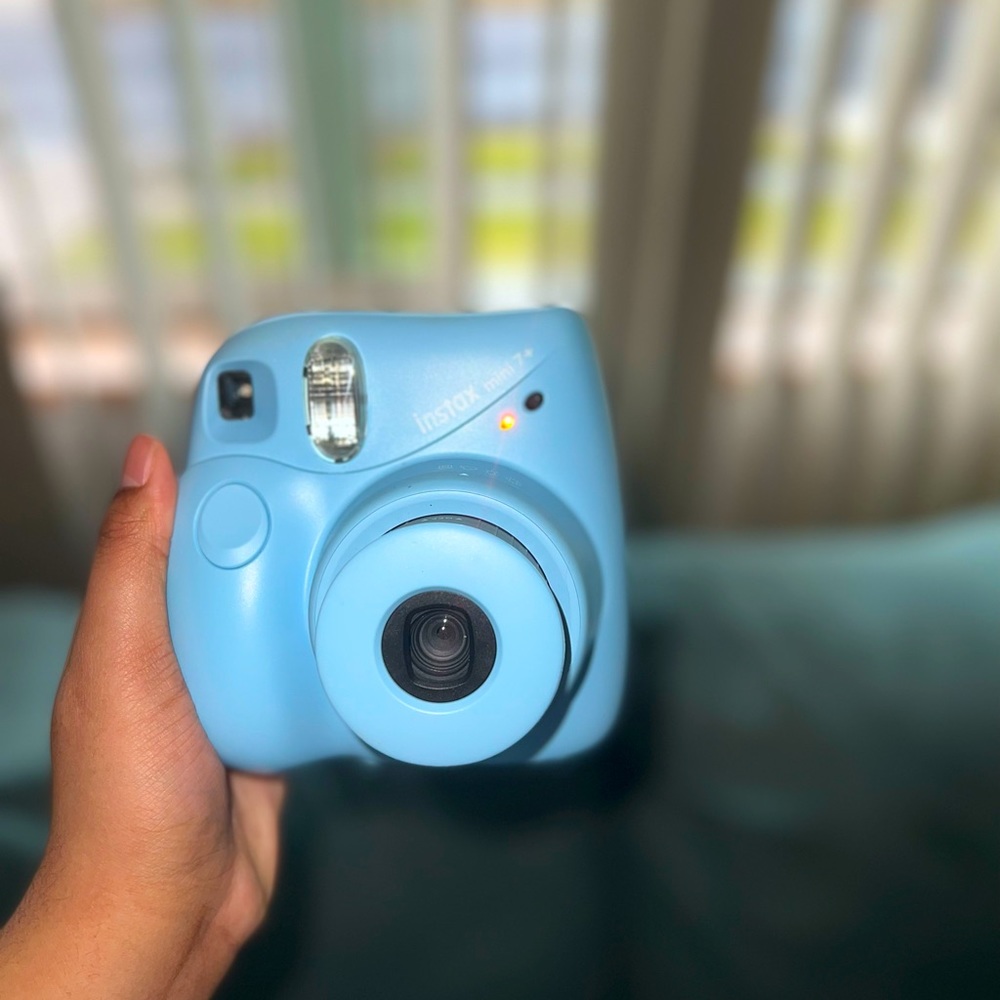 Polaroid mini 7+ used one time like new! I Just don’t like the color blue!